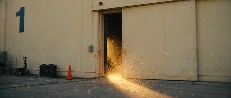 Shot 1: light pours out of stage 1